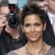 Halle Berry's chunky chains compliment her sequined dress