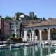 It shows the old port of Desenzano, a city at the lake Garda.
