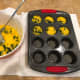 Step 5: Ladle the egg and spinach mixture into the prepared muffin pan.