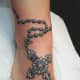 Rosary and celtic cross ankle tattoo