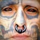 Some of the most insane tattoos are on the face, including eyeballs!