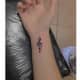 Semicolon with musical note tattoo
