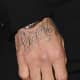 "Victoria" appeared on David's right hand in September 2013.