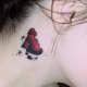 a heart below a person's ear