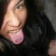 Horizontal tongue piercing