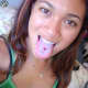 a woman with a double center tongue piercing