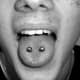 Close-up of an off-center piercing