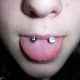 Close-up of an off-center piercing