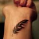feather-tattoos-and-meanings-feather-tattoo-ideas-and-designs