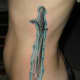 An icy blue sword tattoo.