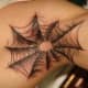 Spiderweb tattoo