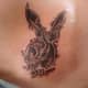 This Playboy bunny tattoo has been designed to look like a skull.