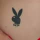 A simple, classic Playboy bunny tattoo.