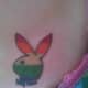 A rainbow-colored bunny tattoo.