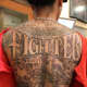 An elaborate and detailed design that covers this tattoo enthusiast's entire back.