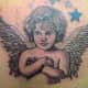 cherub-tattoos-and-meanings-cherub-tattoo-designs-and-ideas-baby-angel-tattoos