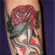 Hourglass with red roses