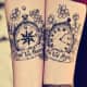 Compass and clock tattoo with text and flowers.