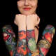 Full-sleeve cornucopia tattoos.