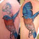 The bird's wing in a dark shade of blue has covered the old tattoo completely.