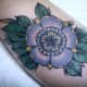 Flower tattoo on arm