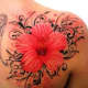 Flower tattoo on shoulder