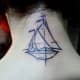 Ship tattoo on neck.