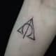 Deathly Hallows and wand tattoo