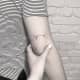 Aries glyph and constellation tattoo