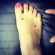 Aries star feet tattoo 