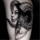 Aries girl with inverted cross tattoo by G.ghost Korea