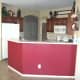 Painting under the high countertop adds color to the kitchen in a simple way.