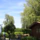 Strandbad (Beachpool) house in Fraueninsel in front of a snack house selling smoked fish rolls, sausages( Bratwurst), beers and softdrinks .
