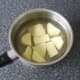 Potato is peeled and chopped in to large chunks for cooking