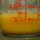 Three quarters of a cup of liquid--juice, zest, and egg.