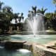 Statues of the Four Seasons by a water feature in Jardin Botanico.