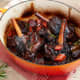 Braised lamb with chorizo and garlic