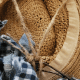 Flip the scarecrow over and create a hook with a long piece of twine.
