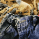 To hold the jeans closed, run a piece of twine through the button hole and fasten to a belt loop.