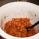 Cook for 4 hours on low, then stir. Mash with a masher, until desired consistency. Then serve and enjoy!