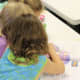 After children got a chance to use the microscope, they got to look through books that showed pictures of cells.
