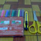 colorful markers, penknife,scissors
