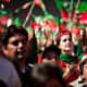 Picture from one of Khan's protest Rallies. People waving the flag of PTI