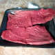 Inside-round marinating steaks