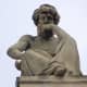 A statue on the roof of the Louvre. It's less dramatic than the preceding shot, but a figure looking down on the photographer from on high is more imposing than a figure shot at eye level