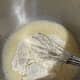 Gradually add in the flour and mix until it's roughly incorporated.