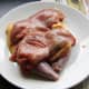The pheasant breasts are removed and set aside with the legs
