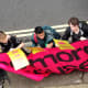Young protesters outside InterContinental Hotel London Park Lane.
