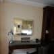 The artwork/mirror over the desk.