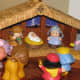 A close-up of the Fisher Price Little People Nativity set. The elephants, lion and bear from the Noah's Ark Little People collection decided to join... 